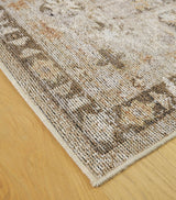 Rolled view of Livdon washable medium rug showing pile and backing