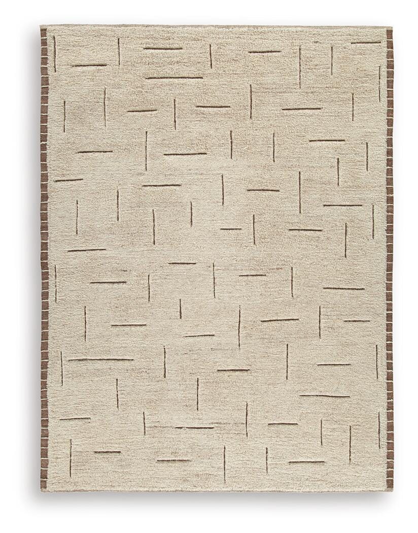Detailed close-up of Clayman rug high-low wool pile texture