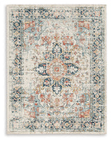 Jarrpage area rug folded revealing backing detail
