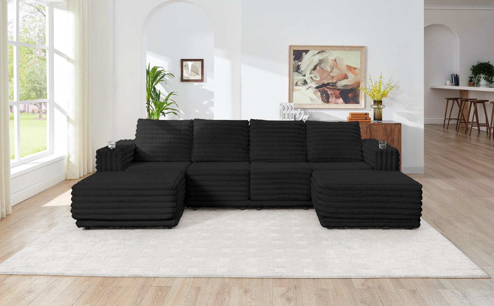 Room view showing Nuve Black Modular Sectional sofa arrangement