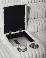 Close-up of console storage and stainless steel cupholders