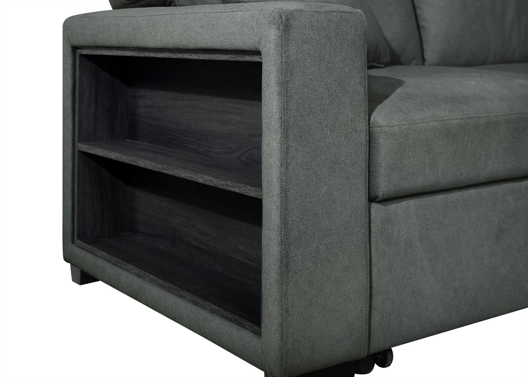 Close-up of bookcase integrated into sofa arm