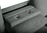 Close-up of drop-down table and cupholders on sofa