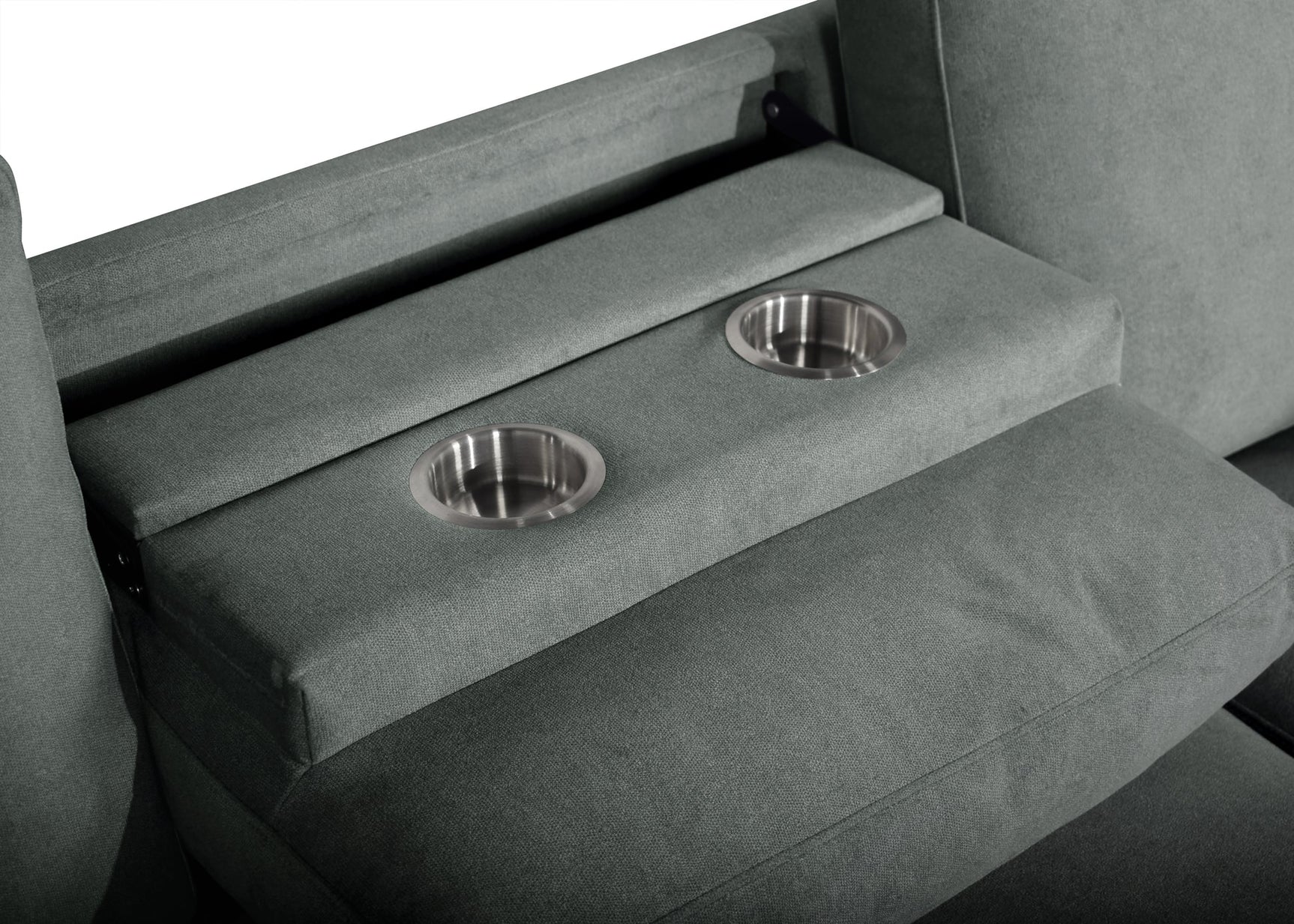 Close-up of drop-down table and cupholders on sofa