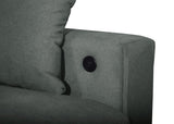 Close-up of USB and Type C ports on sofa arm