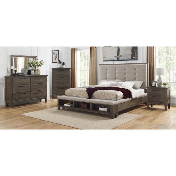 Close-up of tufted headboard on gray queen panel bed