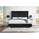 Side angle of Jacklyn Black Faux Leather Tufted Queen Panel Bed