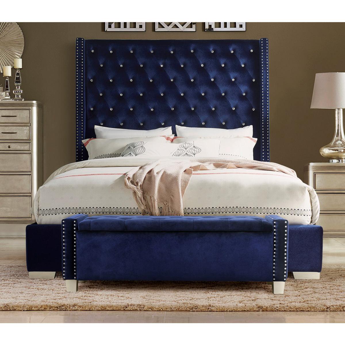 Blue velvet tufted storage bench angled view on hardwood floor