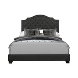 Sandy dark gray queen upholstered tufted bed angled view