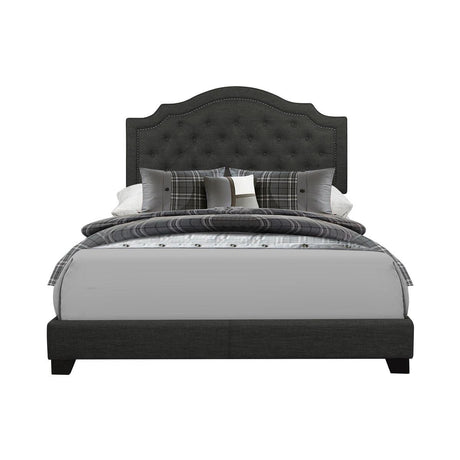 Sandy dark gray tufted full fabric upholstered bed, angled view
