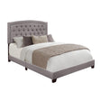 Side angle of Linda Grey king bed with rolled sides and grey fabric