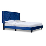 Close-up of tufted velvet headboard on Ivy Blue Bed