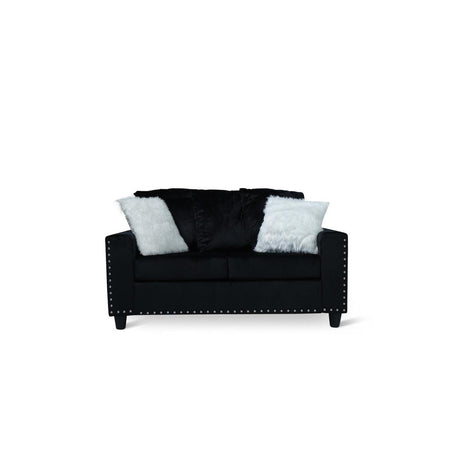 Black velvet loveseat with two pillows, front view