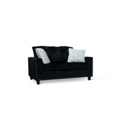 Black velvet loveseat with two pillows, side view
