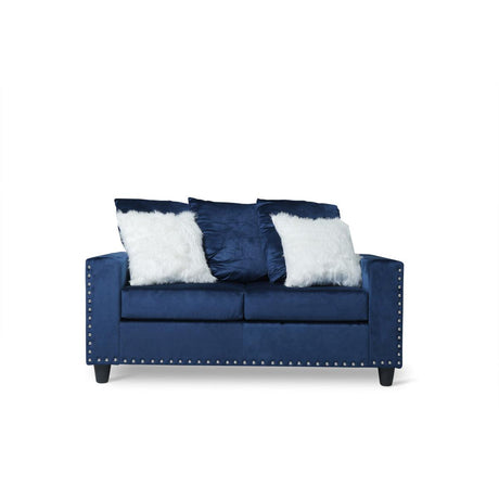 Blue velvet loveseat front view showing upholstery and pillows