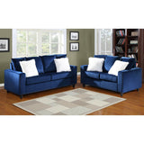Blue velvet loveseat angled view with pillows
