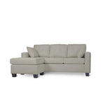 Close-up of gray fabric and pillows on Scott Gray sofa chaise