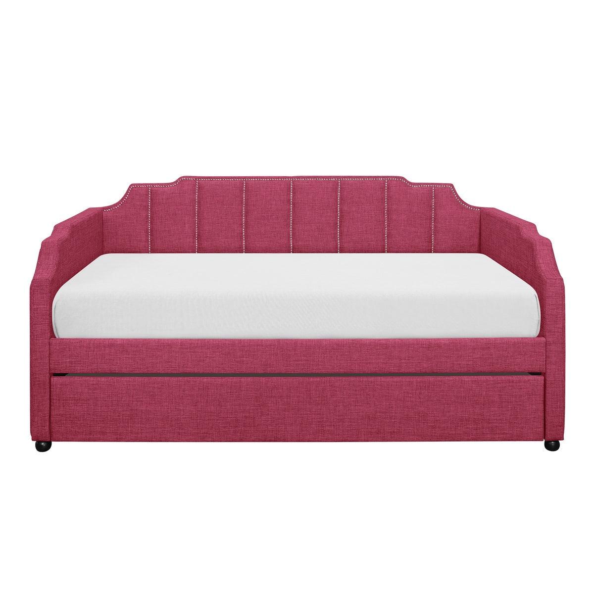Pink youth daybed side view showing fabric upholstery and metal frame