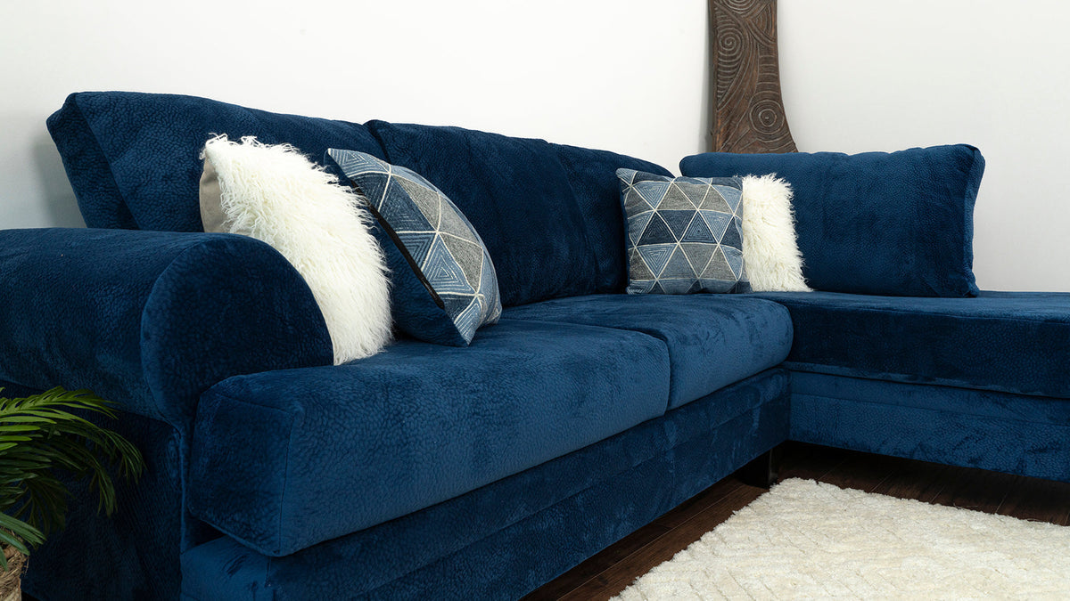Close-up detail of navy plush fabric on Selena sectional