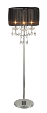 Close-up of ivory glass shade and crystal chandelier detail on lamp