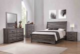 Coralee Gray Wood Sleigh King Bed with curved headboard and footboard