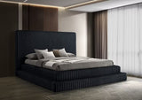 Side view of Micah Henley black upholstered platform bed