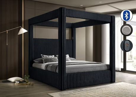 Side view of Atlam Henley Black Upholstered Canopy Platform Bedroom Set bed