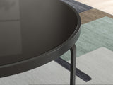 Round tempered black glass coffee table detail