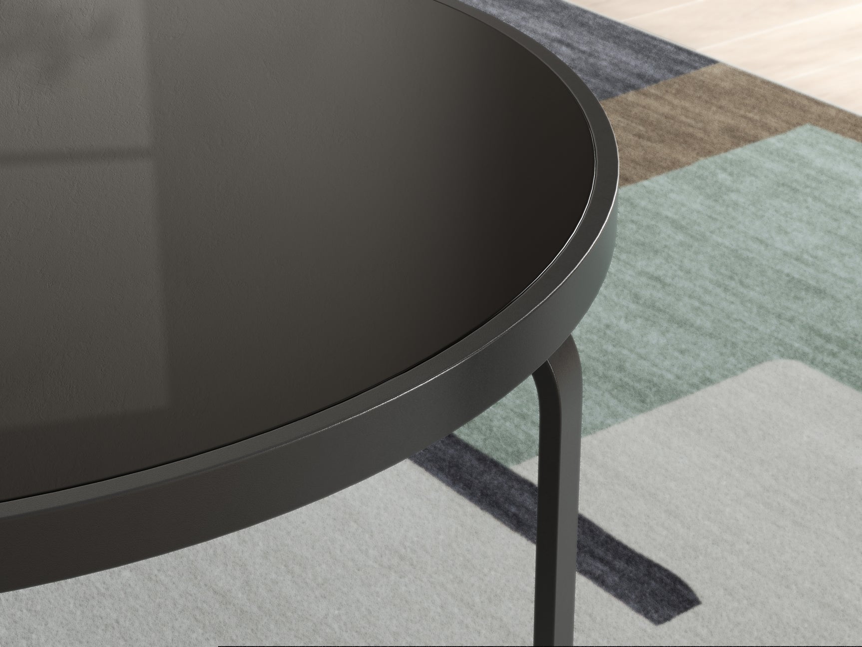 Round tempered black glass coffee table detail