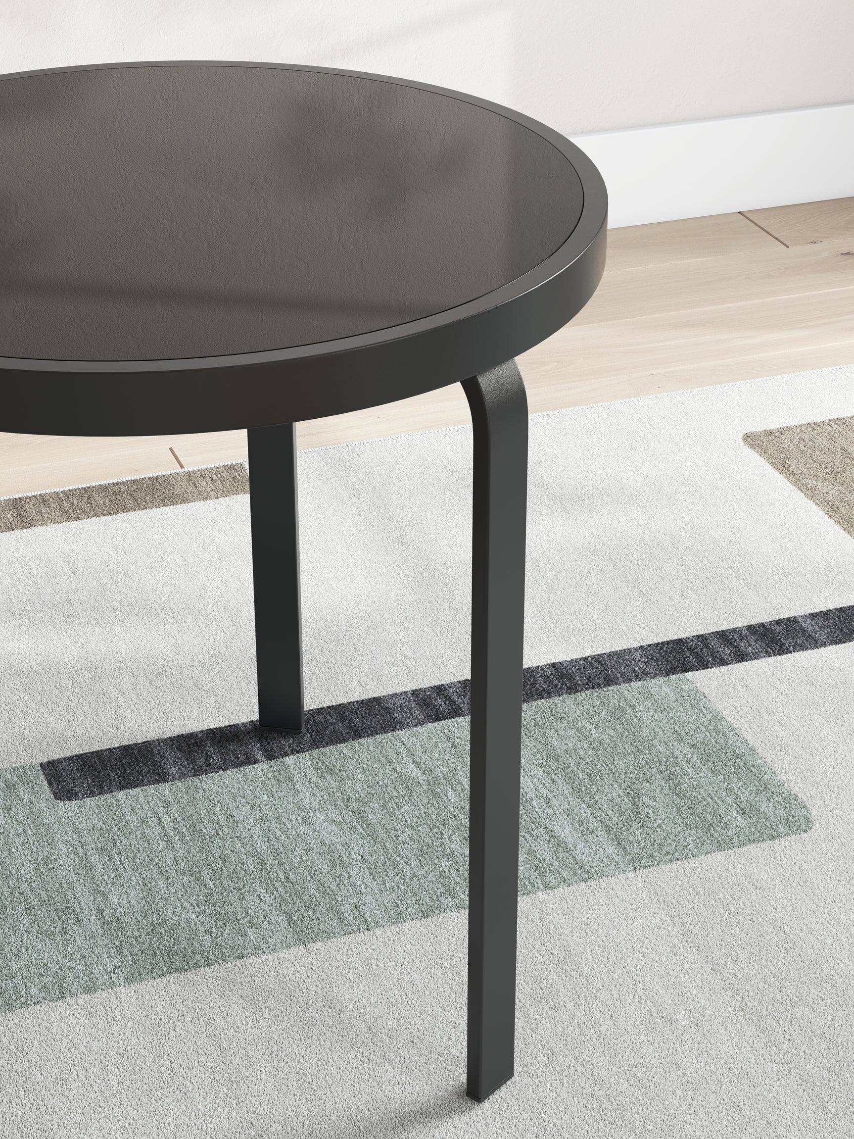 End table with matte black metal frame detail