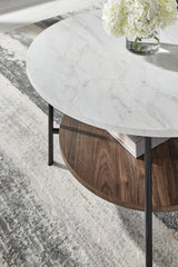 Close-up of coffee table detail showing faux marble top and wood grain shelf