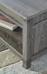 Detail of Freedan Grayish Brown Lift-top Coffee Table surface texture