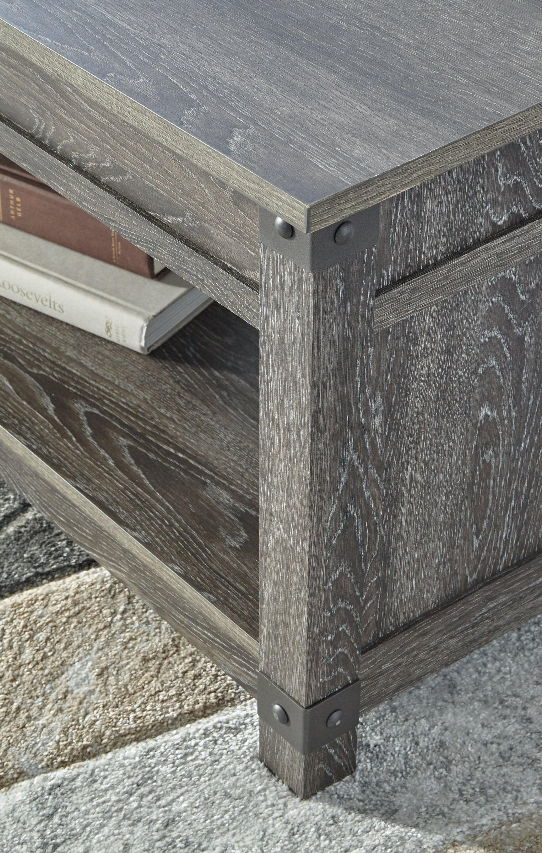Detail of Freedan Grayish Brown Lift-top Coffee Table surface texture