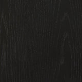 Close-up of rich black wood grain finish