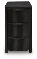 Front view showing three drawers closed