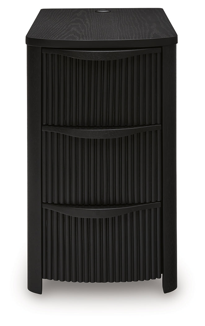 Front view showing three drawers closed
