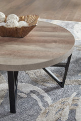 Close detail of coffee table's grayish brown laminate surface