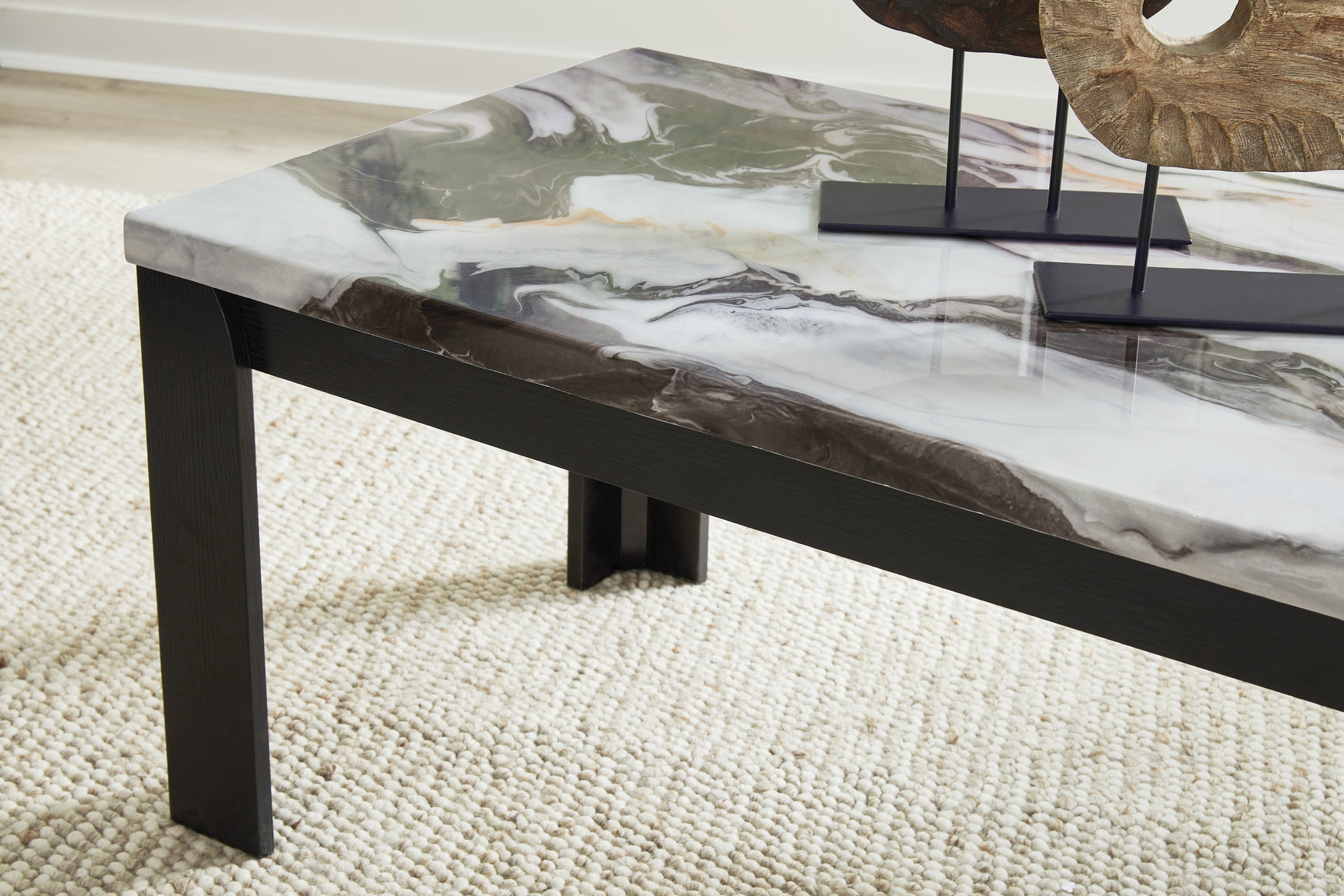 Detail of dark brown wood grain finish on coffee table base