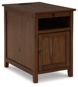Treytown Brown Chairside End Table angled front view with door open showing storage