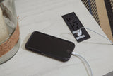 Close-up of power supply and USB ports detail