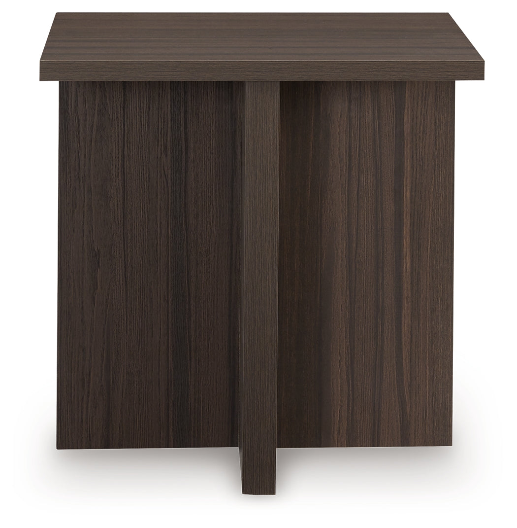 Coffee table front angle in contemporary living room setting