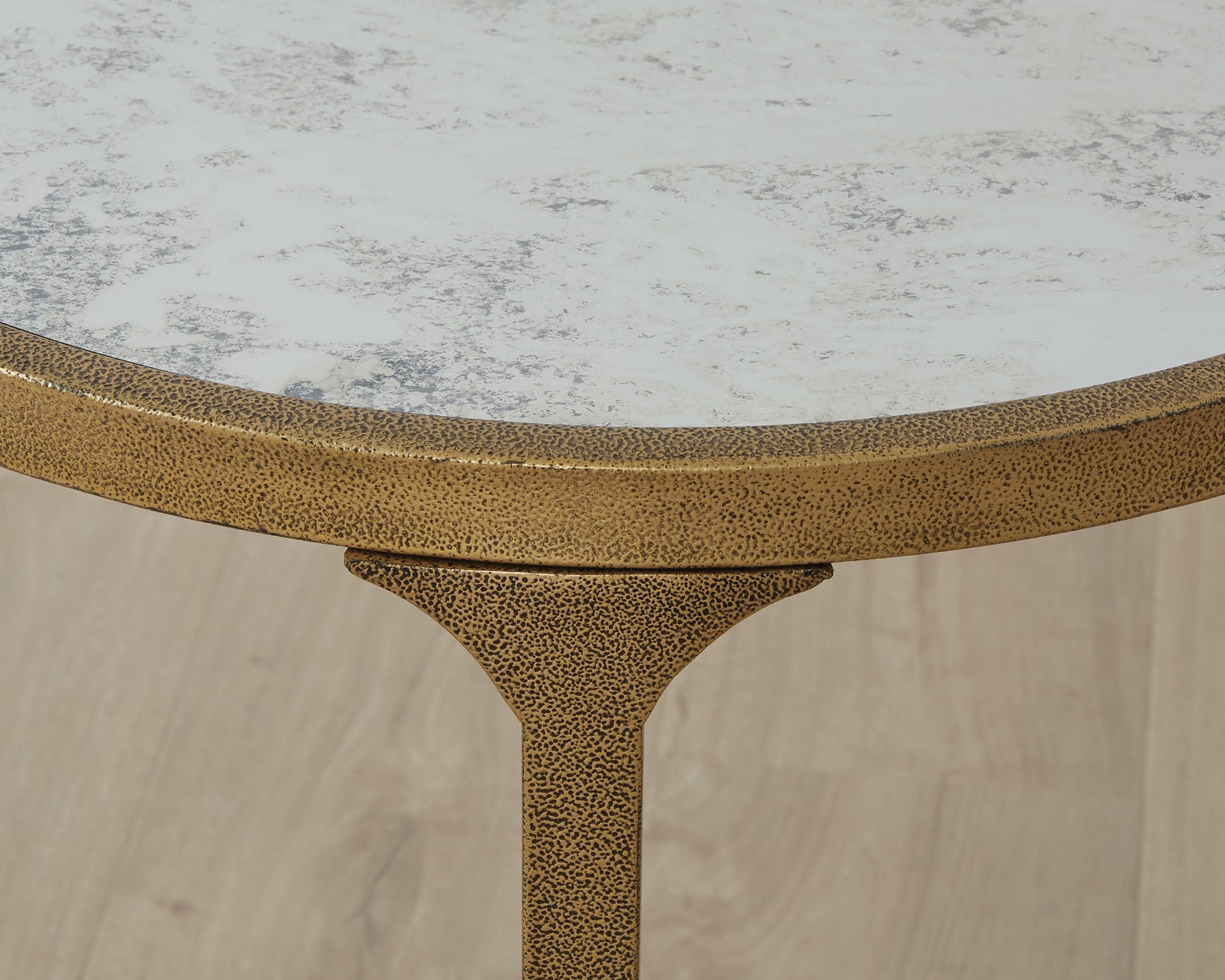Finish detail of Korajane antiqued gold powder coat
