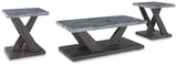 Coffee table with faux gray marble top and casters under soft lighting