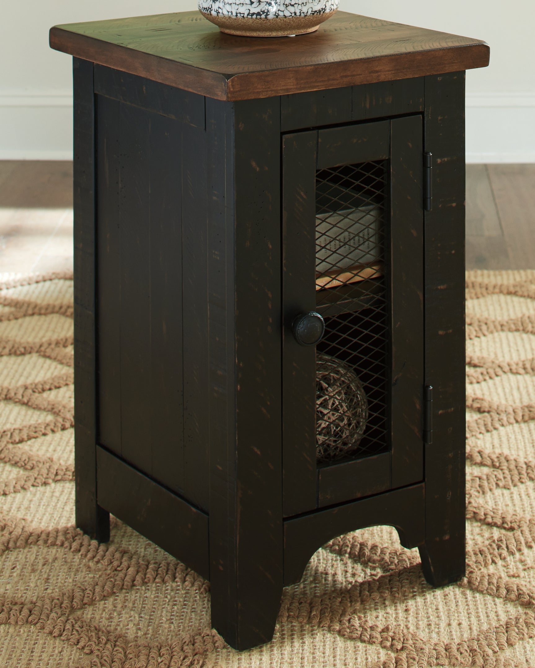 Side angle view of Valebeck coffee table and end table set