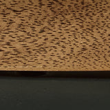 Top down view of Noraluna Medium Brown Round Coffee Table