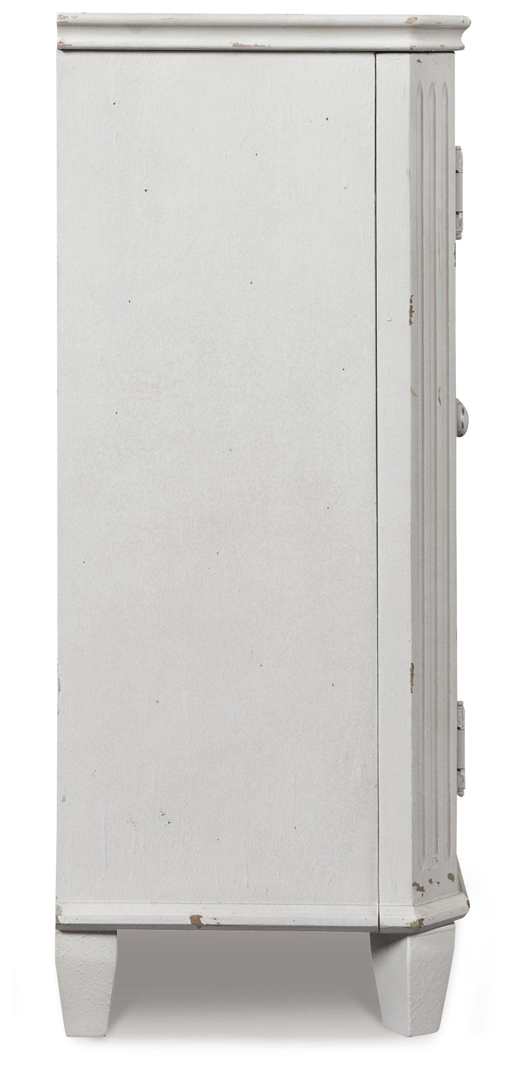 Side view of Mirimyn Antique White Accent Cabinet