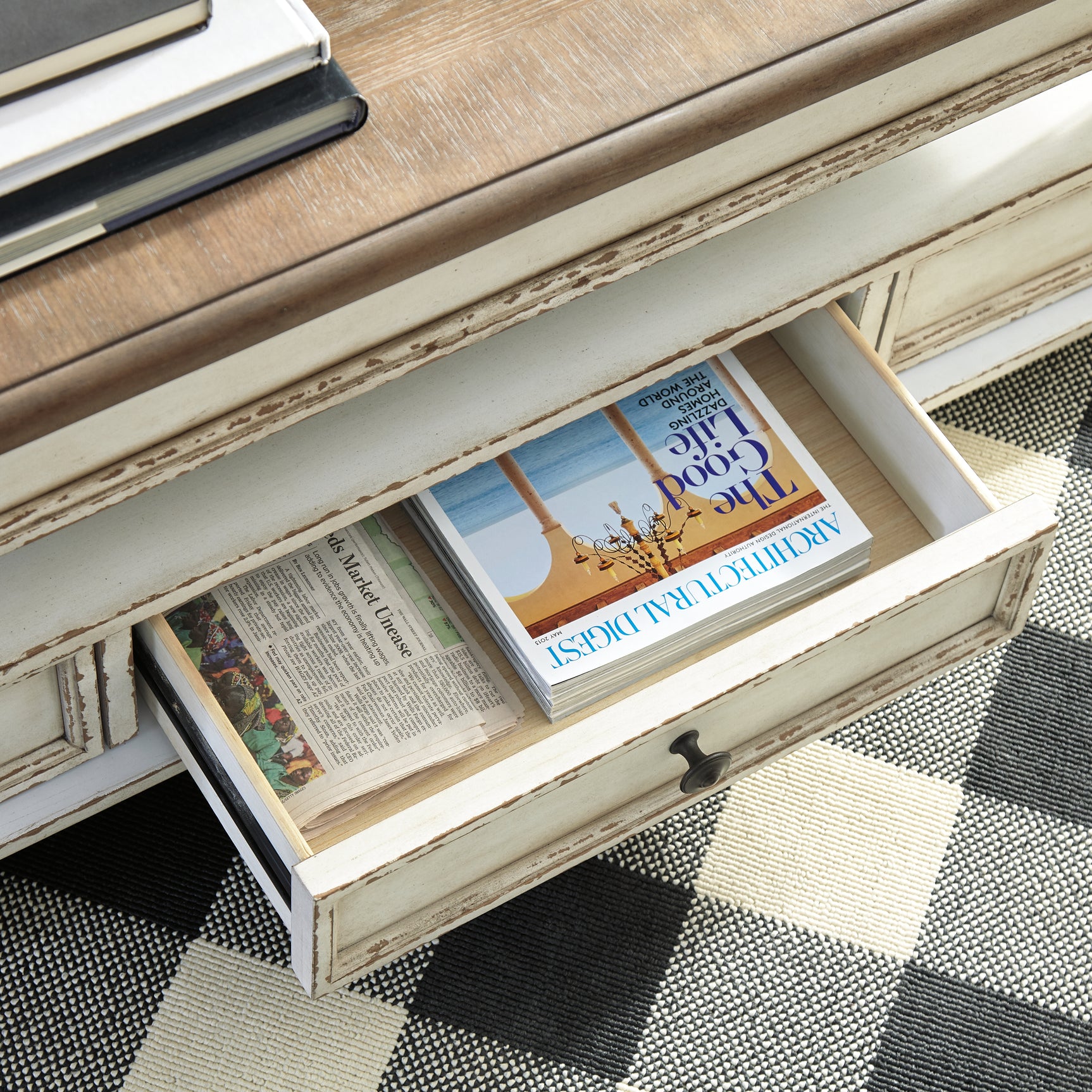 Realyn Coffee Table with Two End Tables in white and brown finish
