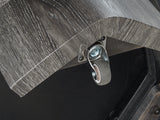 Weathered gray wood grain finish detail on Surmour Coffee Table leg