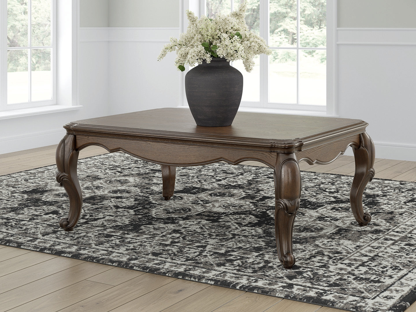 Maylee Coffee Table dark brown traditional style angled view