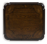 Detailed view of leg carving on Maylee end table